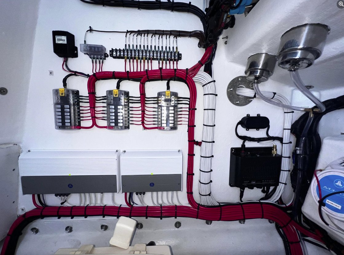 Marine electrical panel installation with breaker panels and amplifiers