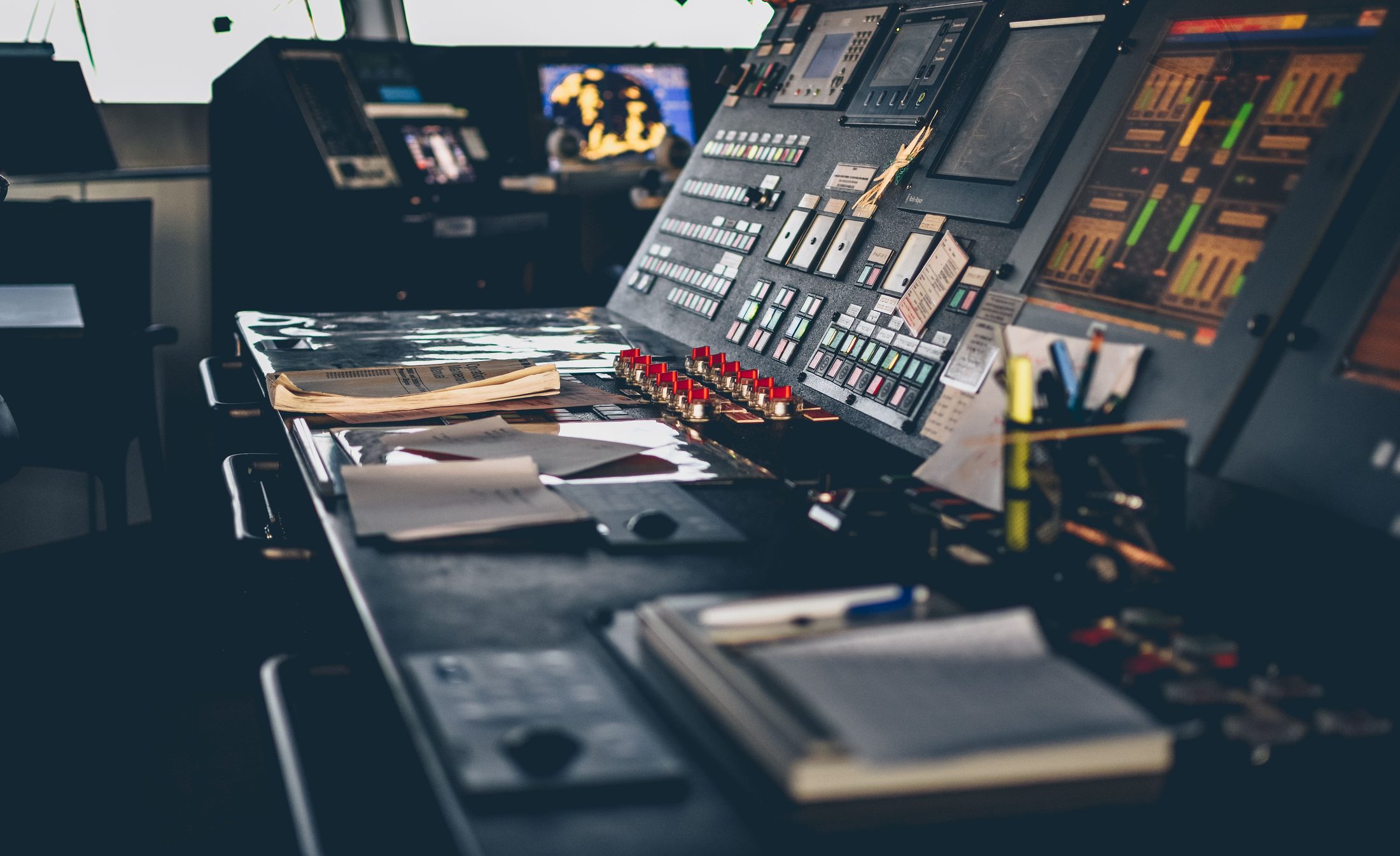 Marine engineering control console with schematics and manuals